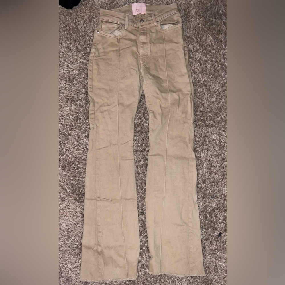 Beige pants, hardly worn, khaki style.